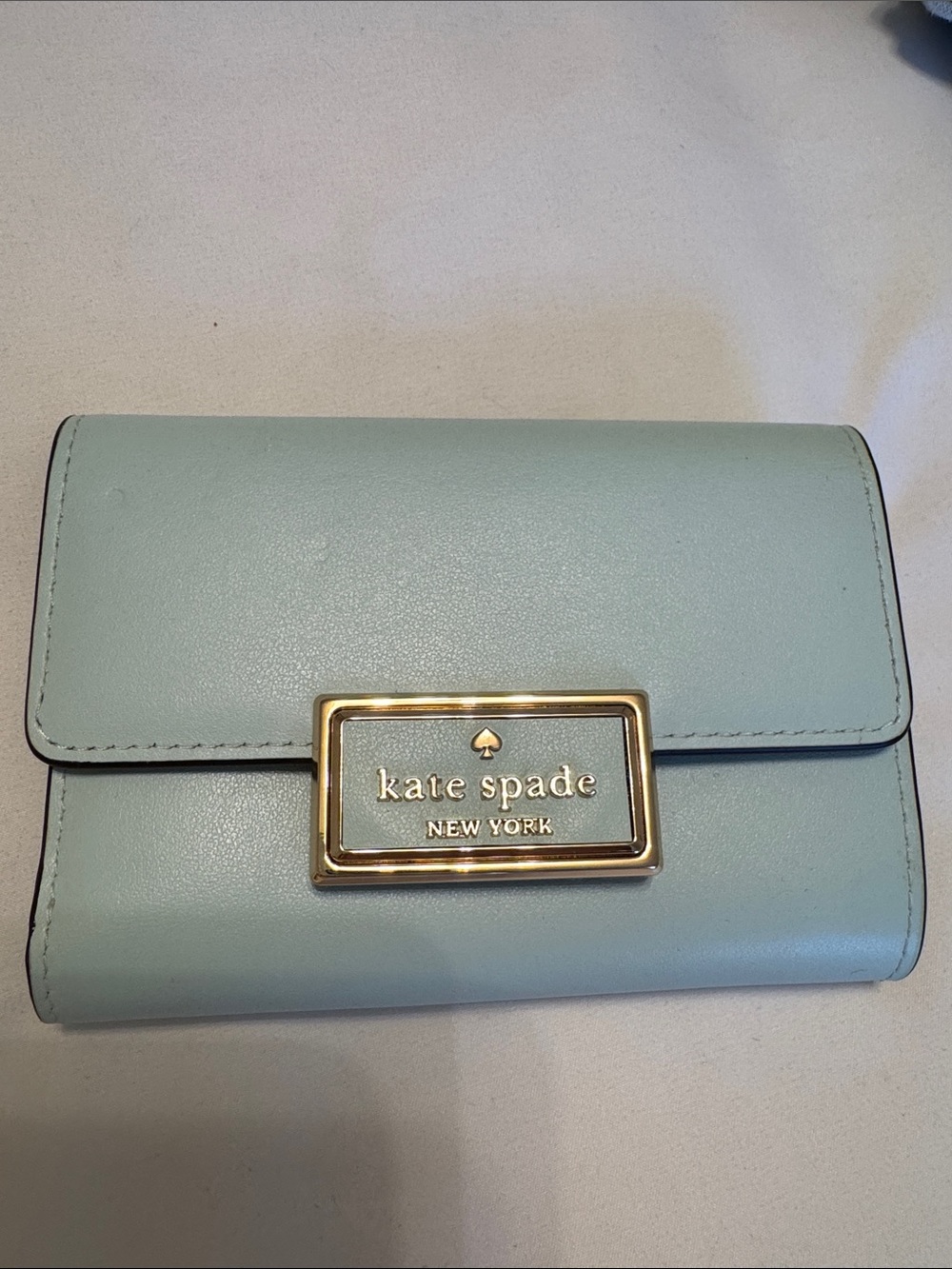 kate spade “Regan” light blue Leather Wallet with Gold Logo logo